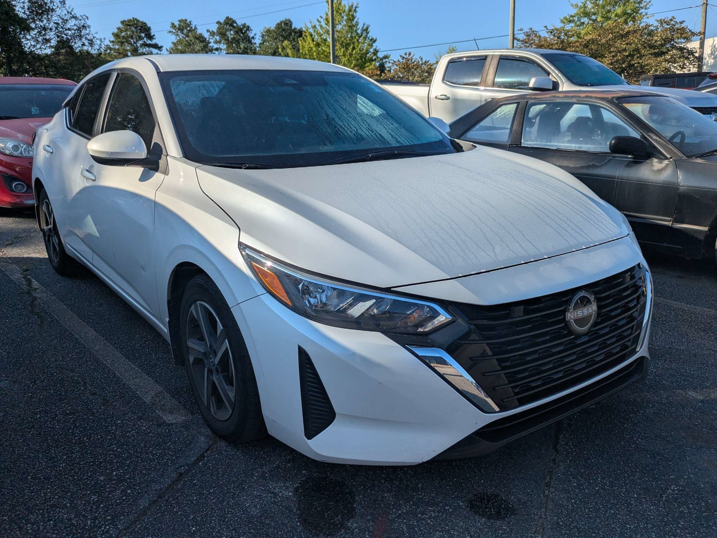 Used 2024 White Nissan SV image 1