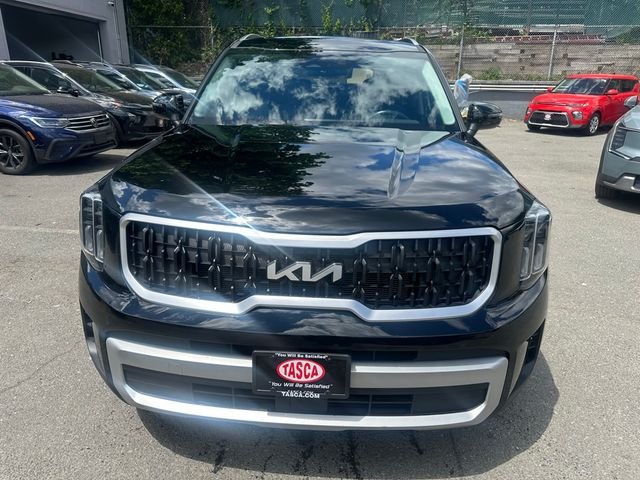 Used 2024 Ebony Black Kia EX image 5