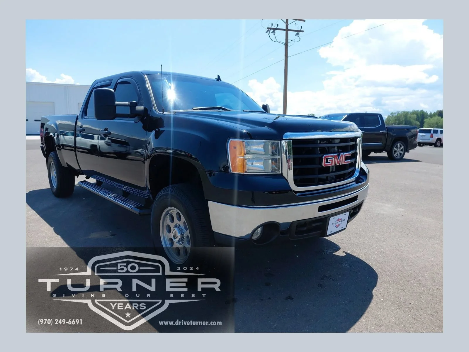 2009 GMC Sierra 4WD Crew Cab 8ft SLE SRW's photo