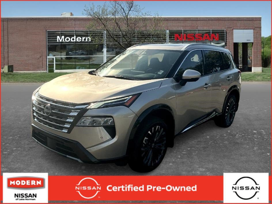 Used 2025 Champagne Silver Metallic Nissan Platinum image 1