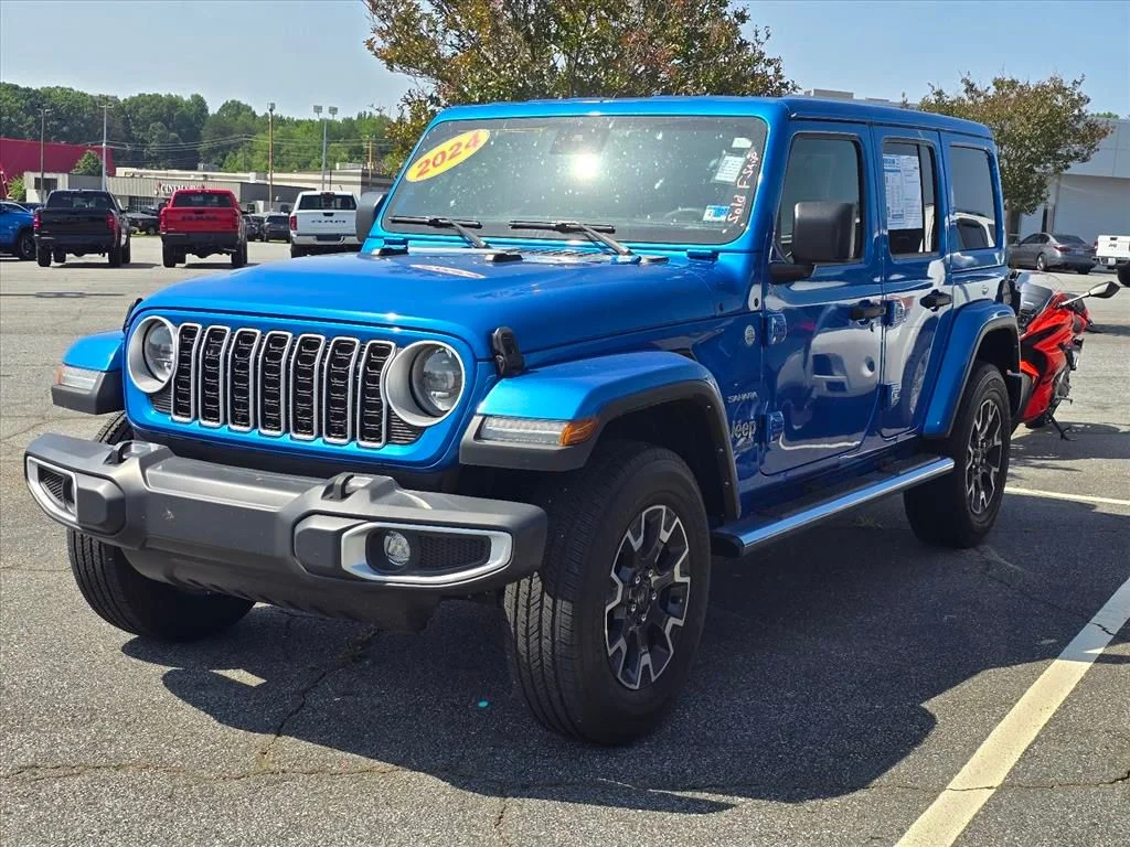 Used 2024 Blue Jeep Sahara image 2