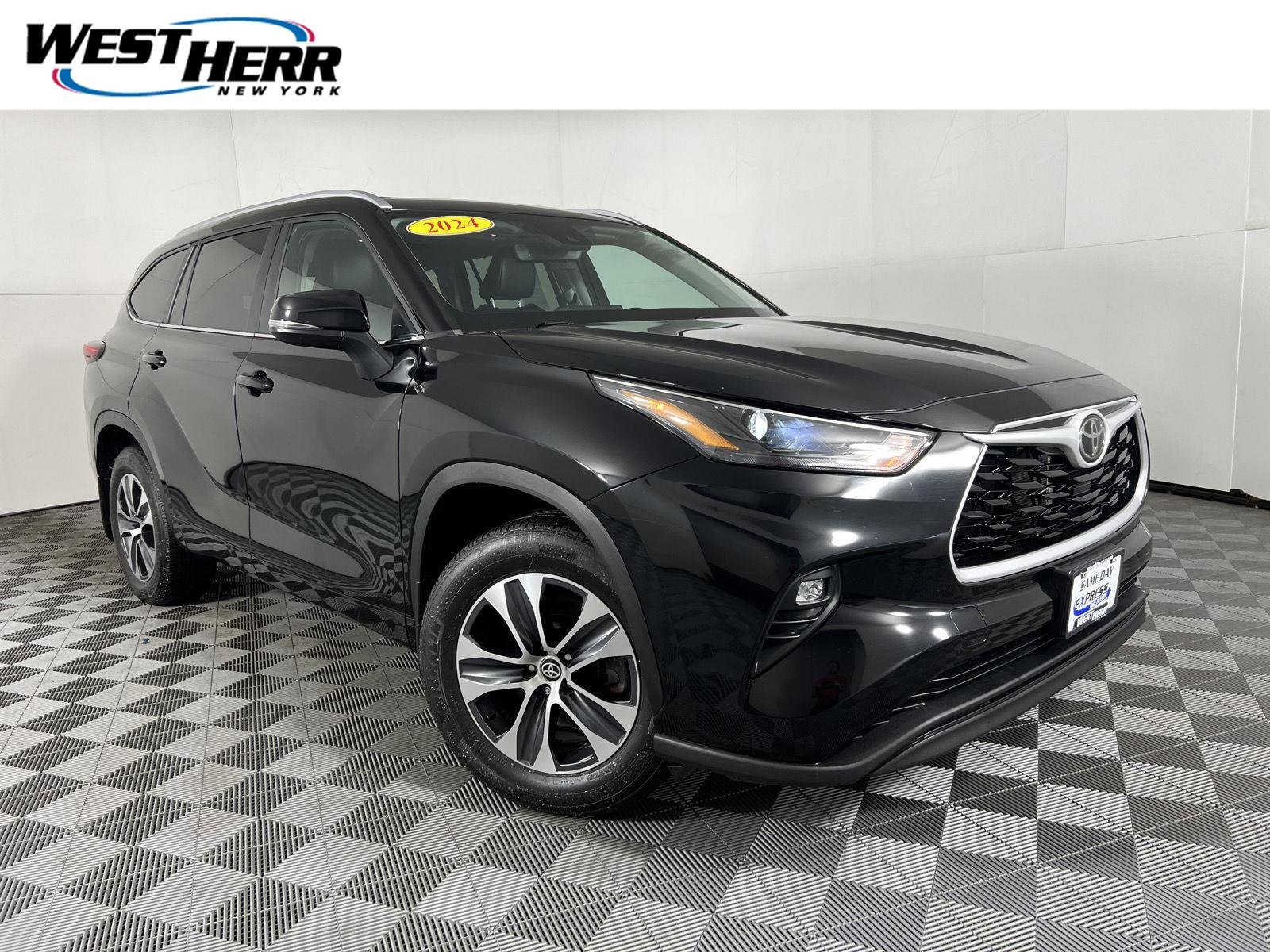 Used 2024 Midnight Black Metallic Toyota XLE image 1