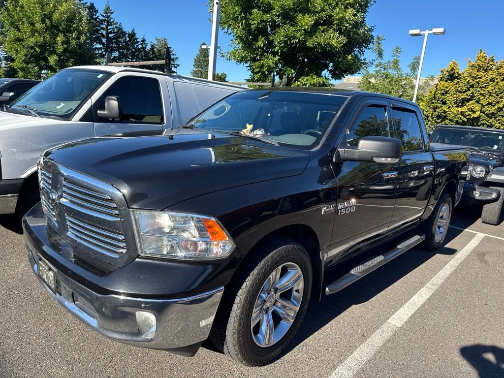 Used 2018 Brilliant Black Crystal Pearlcoat Ram SLT image 2