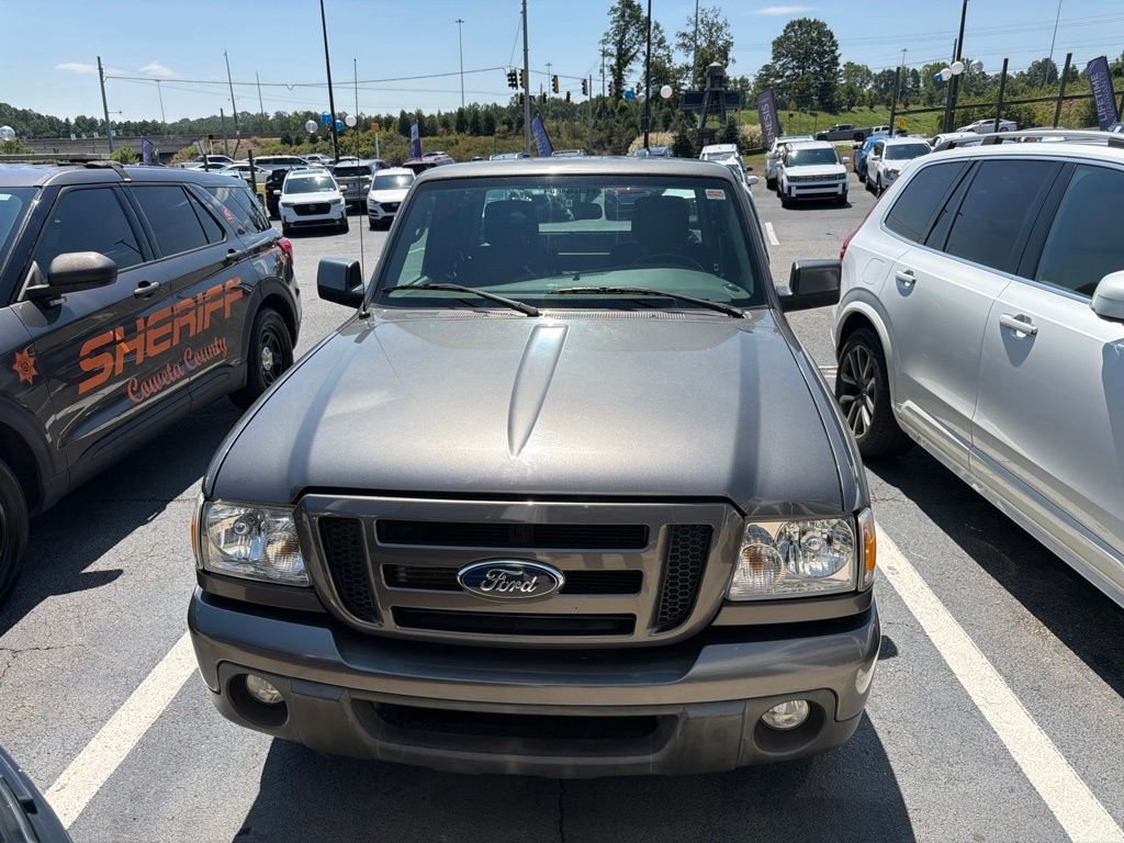 Used 2011 Gray Ford Sport image 1