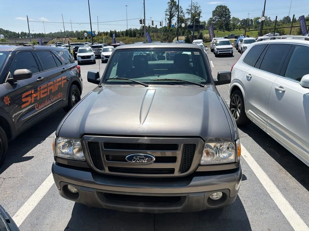 Used 2011 Gray Ford Sport image 1