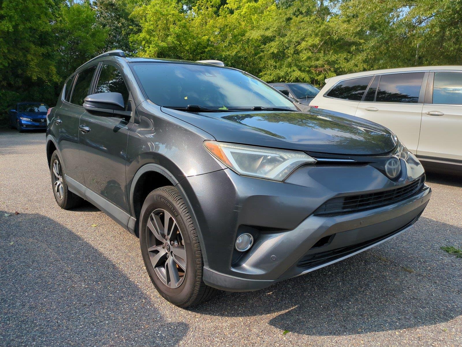 Used 2018 Magnetic Gray Metallic Toyota XLE image 1
