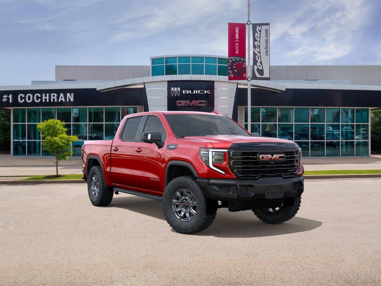 New 2026 VOLCANIC RED TINTCOAT GMC AT4X image 1