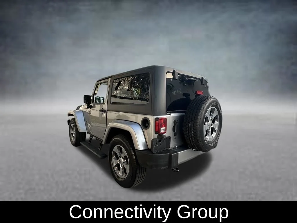 Used 2016 Silver Jeep Sahara image 5