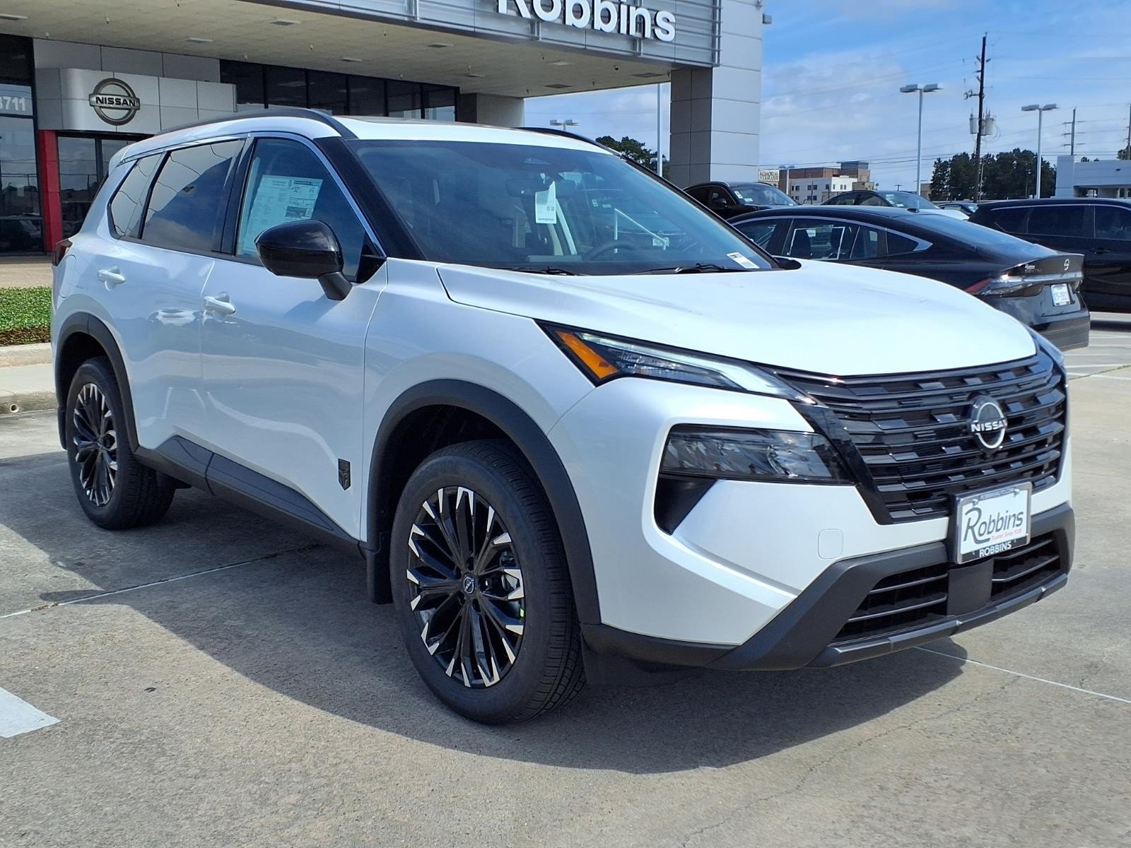 2026 Nissan Rogue Dark Armor™ White at Robbins Nissan