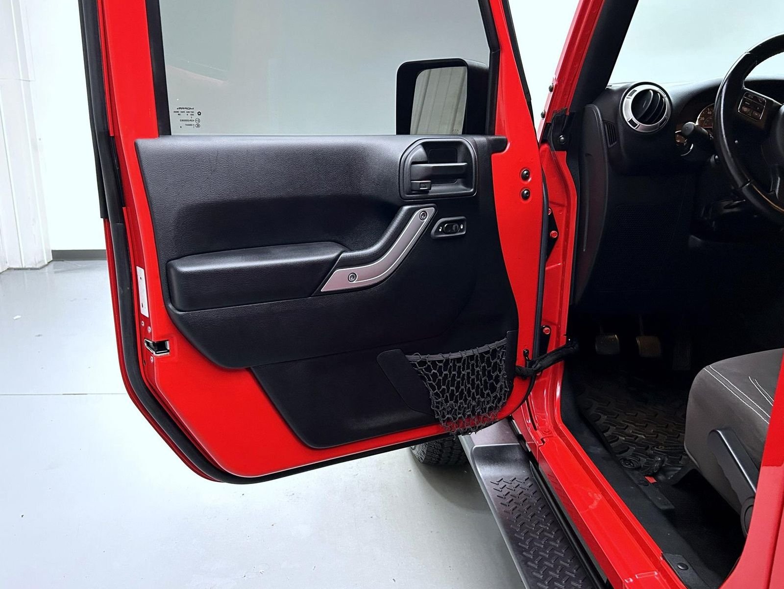 Used 2016 Red Jeep Unlimited Sahara image 9