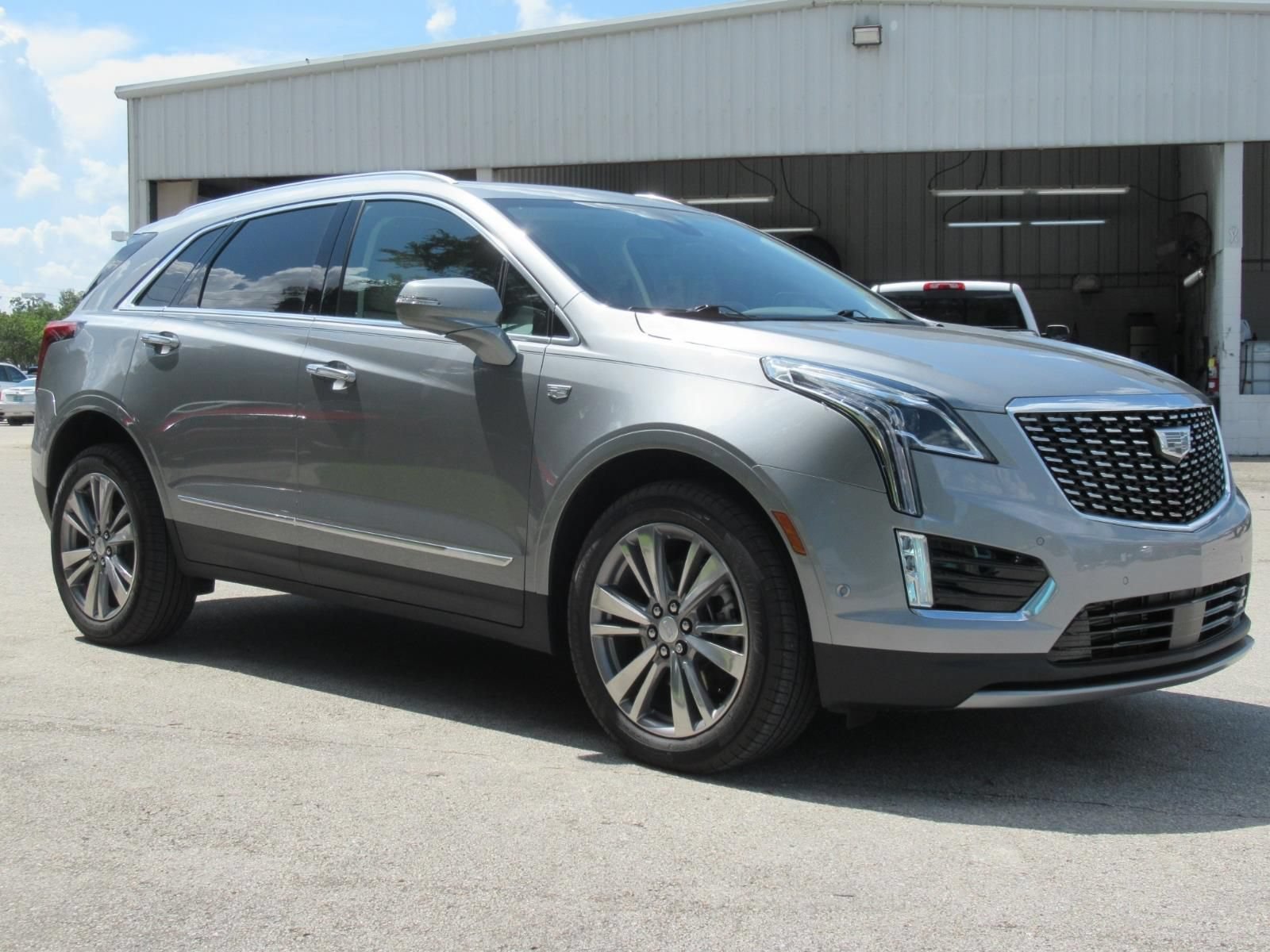 Used 2024 Argent Silver Metallic Cadillac Premium Luxury image 1