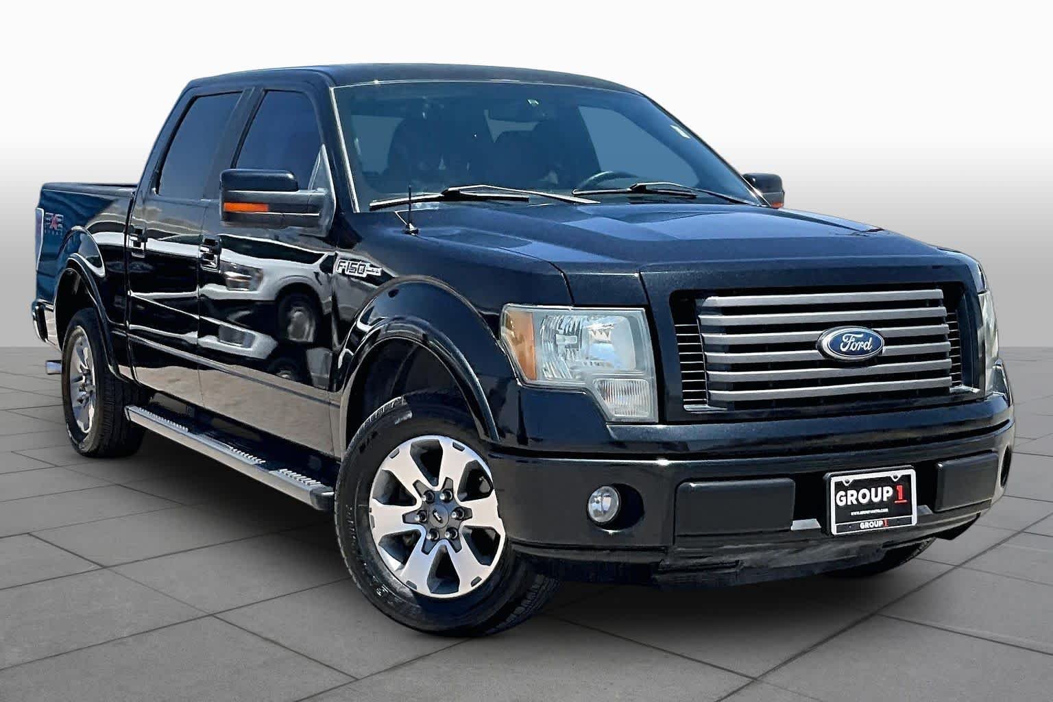 Used 2010 Tuxedo Black Ford XLT image 2