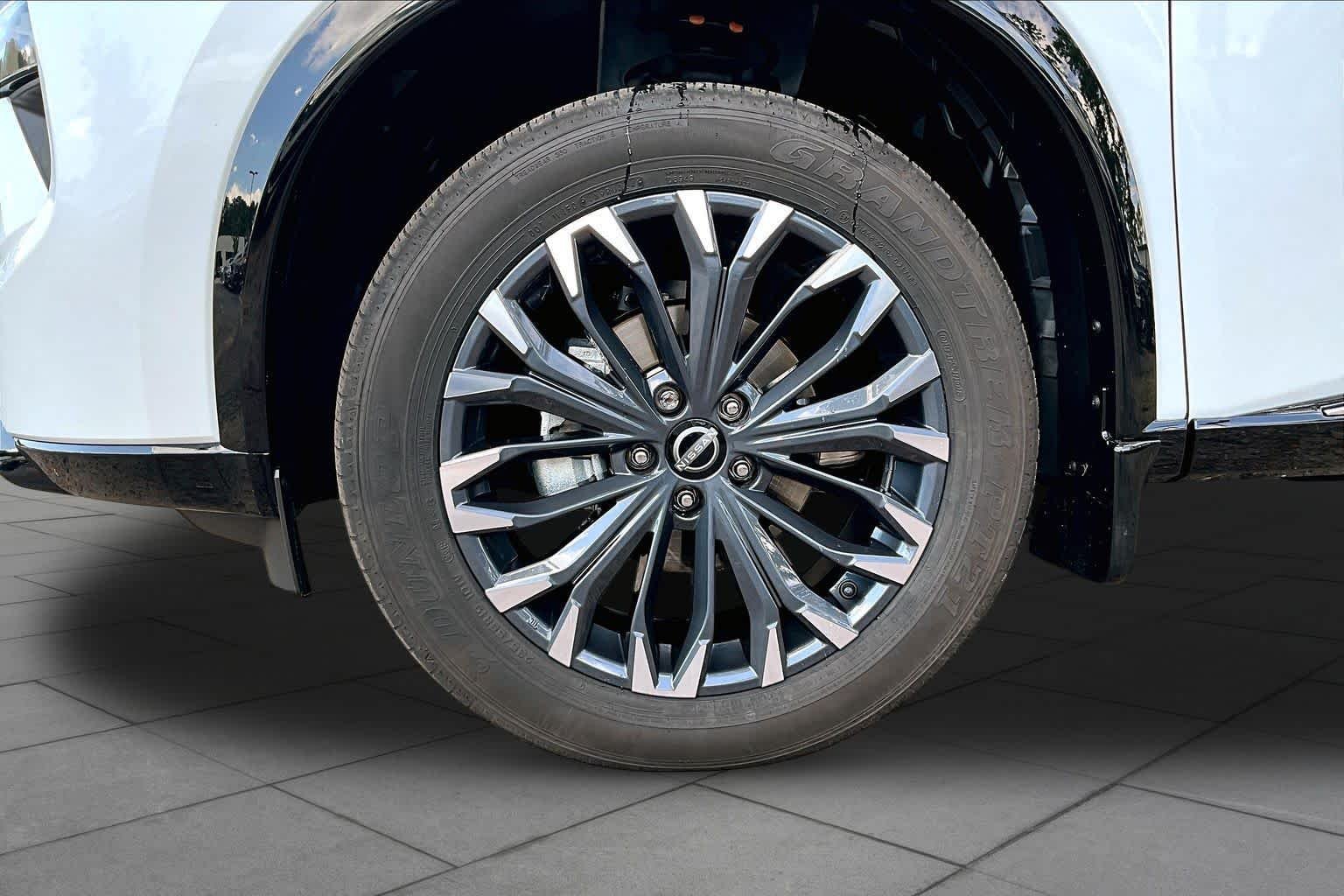 Used 2024 Everest White Pearl Nissan Platinum image 11