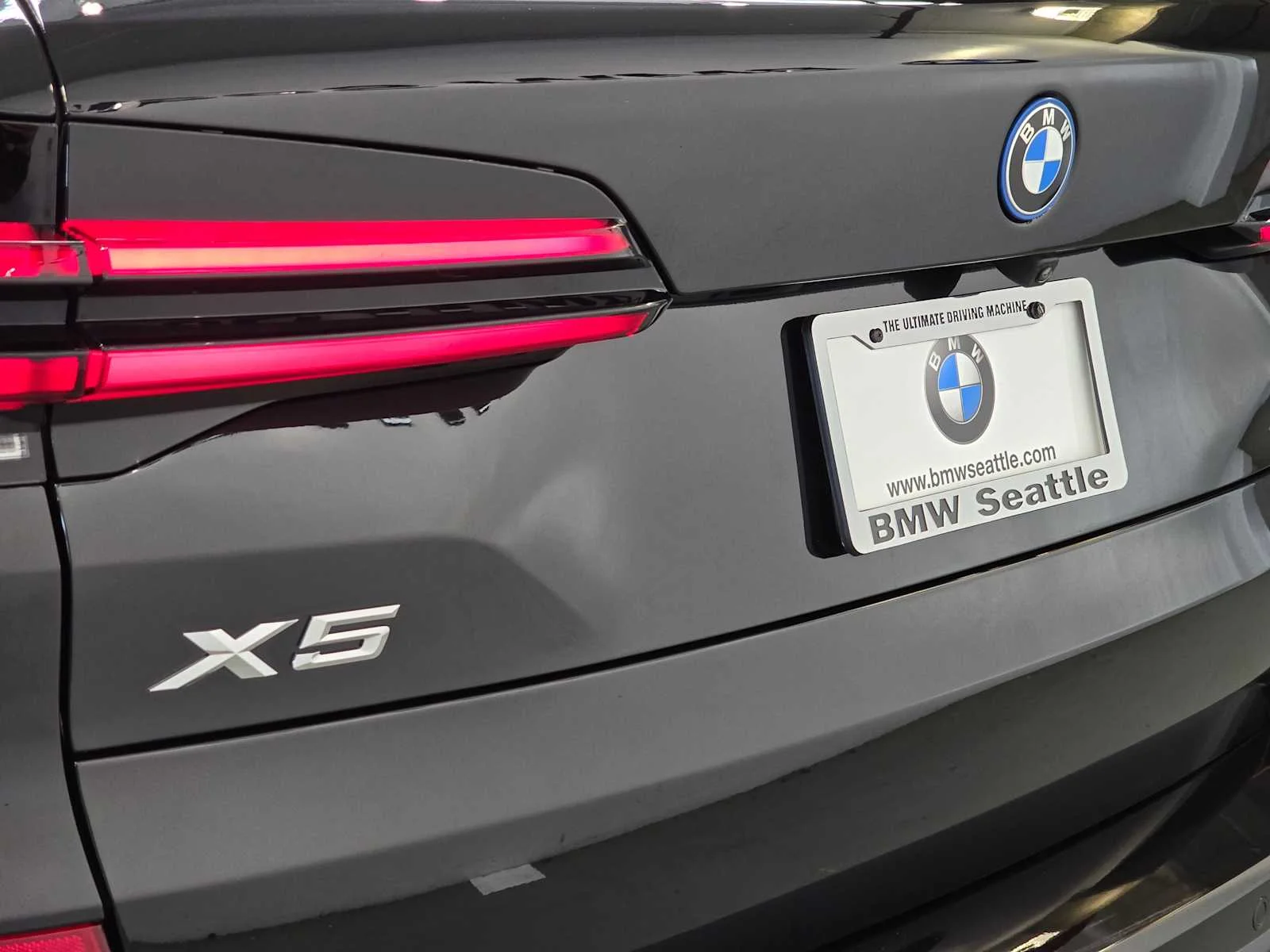 Used 2024 Black Sapphire Metallic BMW xDrive50e image 7