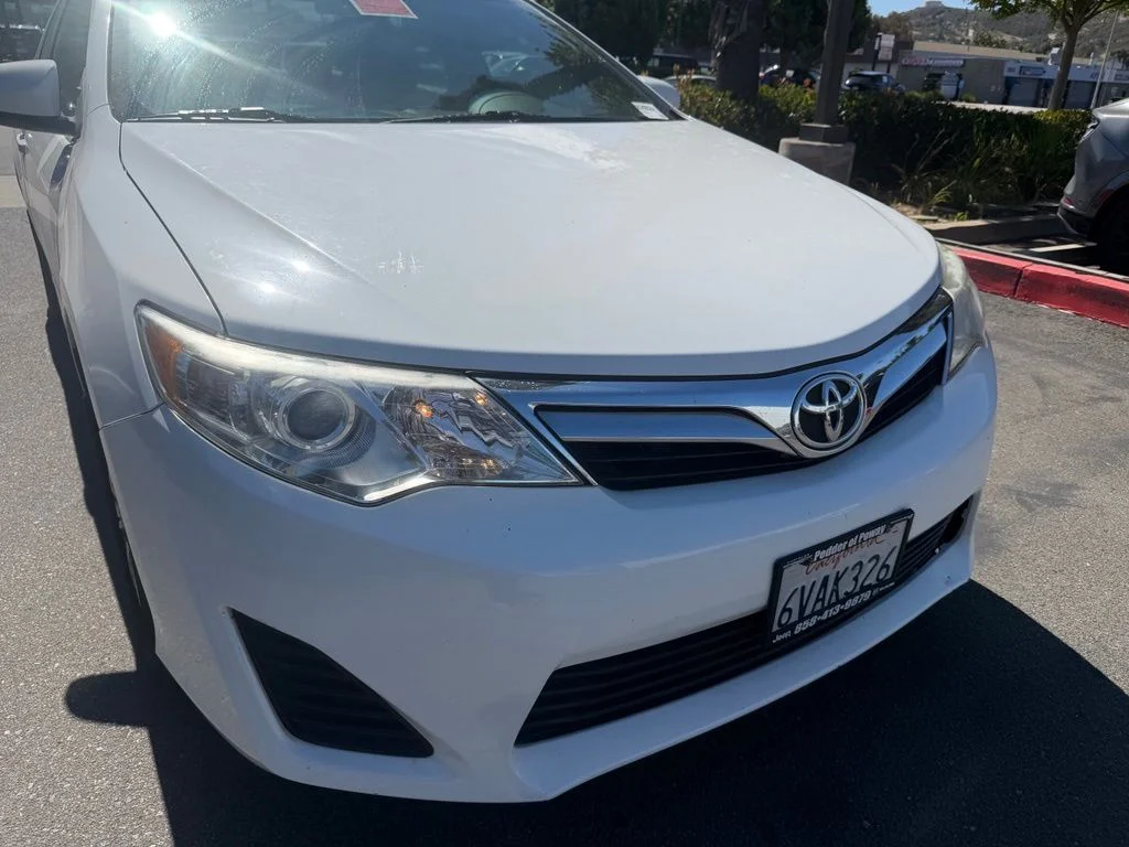 Used 2012 White Toyota LE image 1