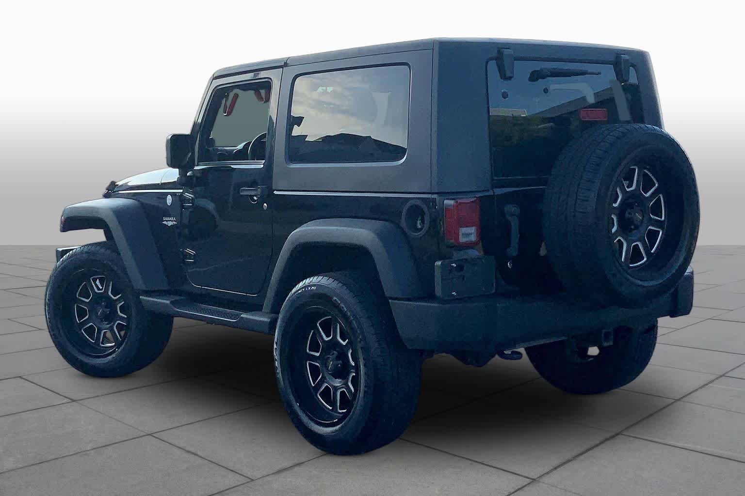 Used 2010 Black Jeep Sport image 10