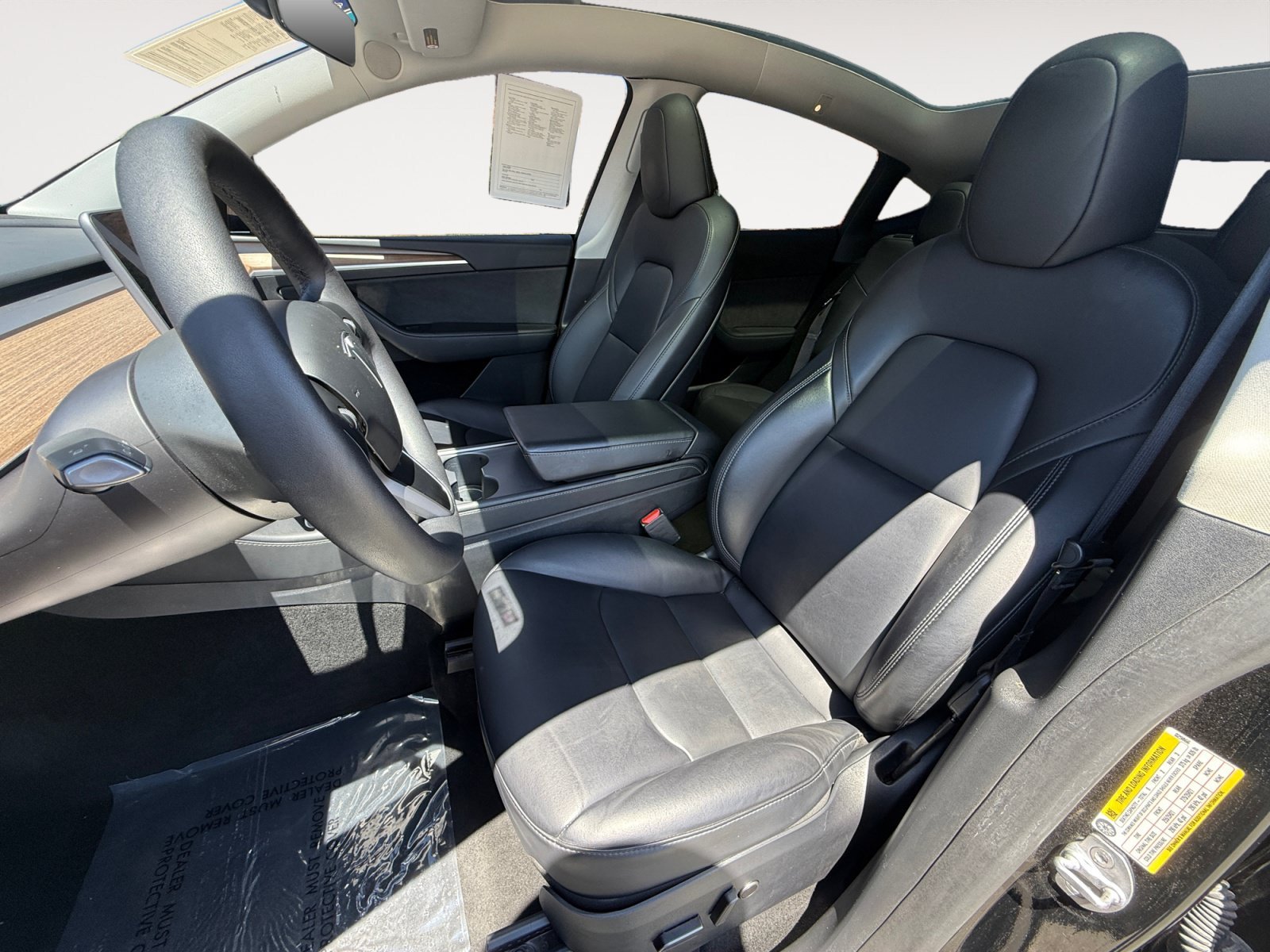 Used 2024 Solid Black Tesla Performance image 10