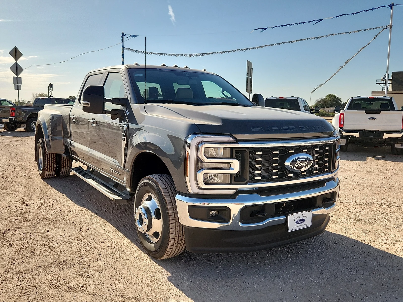 New 2026 Carbonized Gray Metallic Ford Lariat image 1