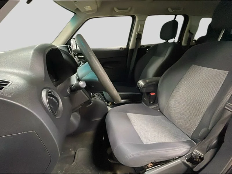 Used 2015 Black Clearcoat Jeep Sport image 10