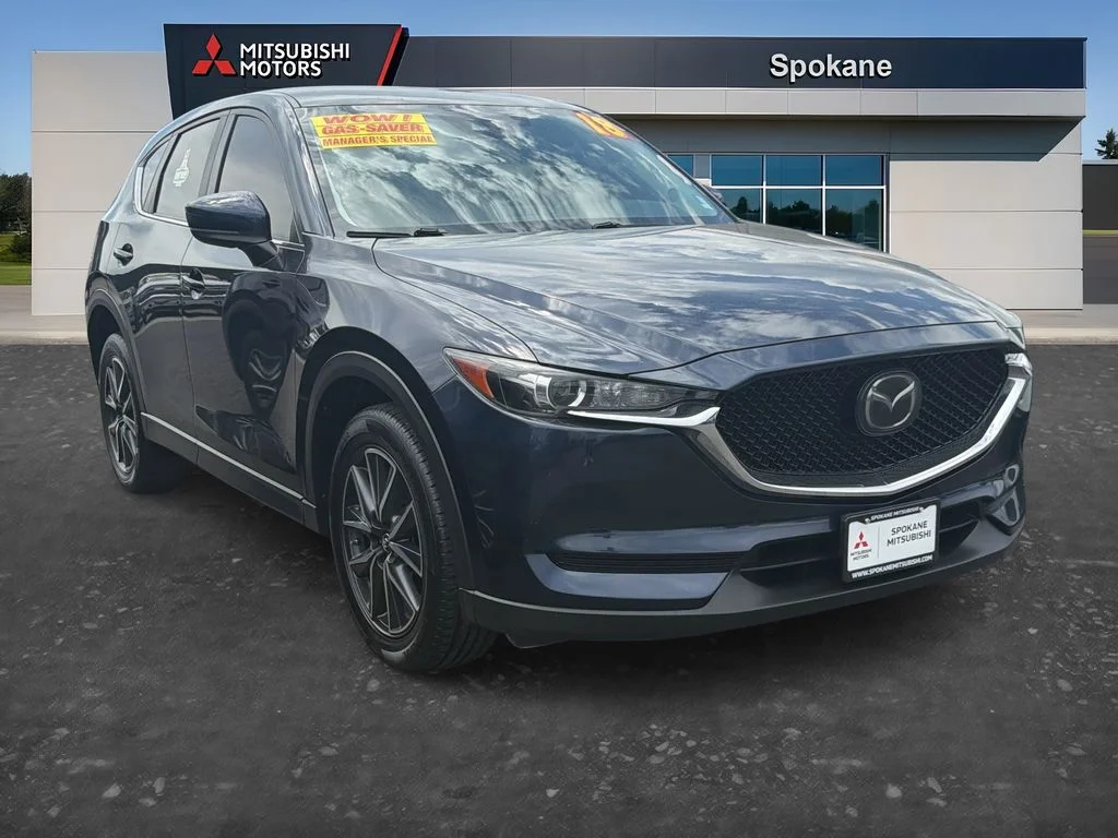 Used 2018 Deep Crystal Blue Mica Mazda Touring image 1