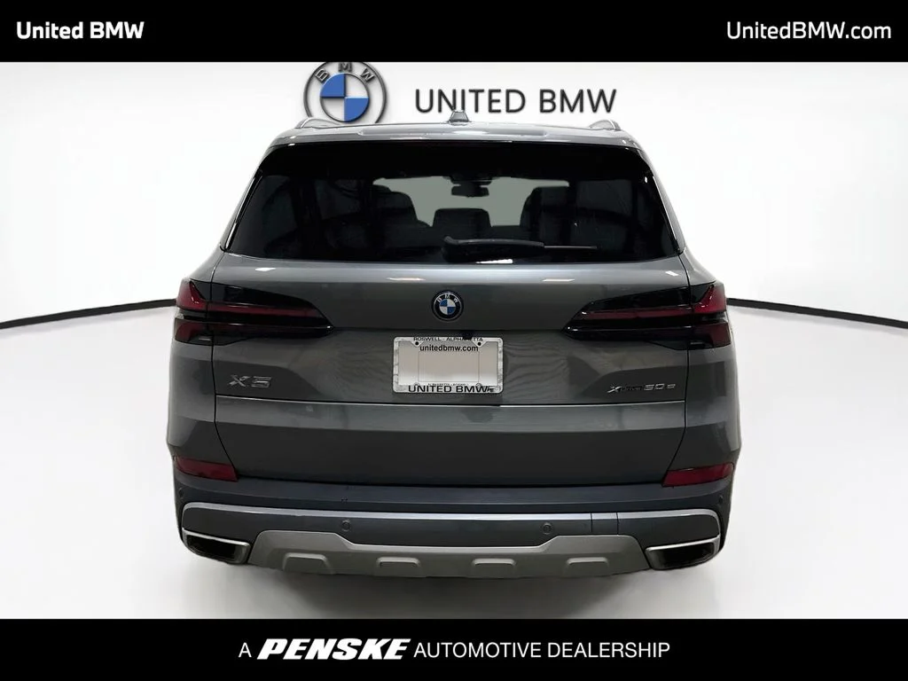 Used 2025 Skyscraper Grey Metallic BMW xDrive50e image 6