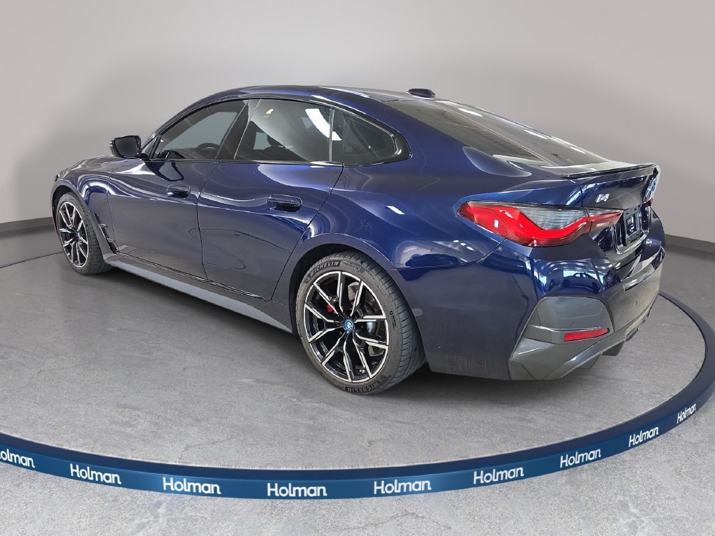 Used 2023 Tanzanite Blue II Metallic BMW eDrive40 image 9