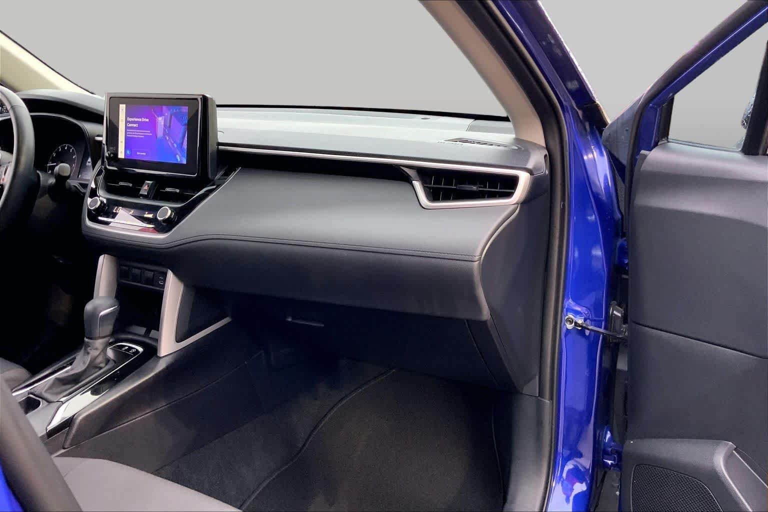 Used 2024 Blue Crush Metallic Toyota LE image 19
