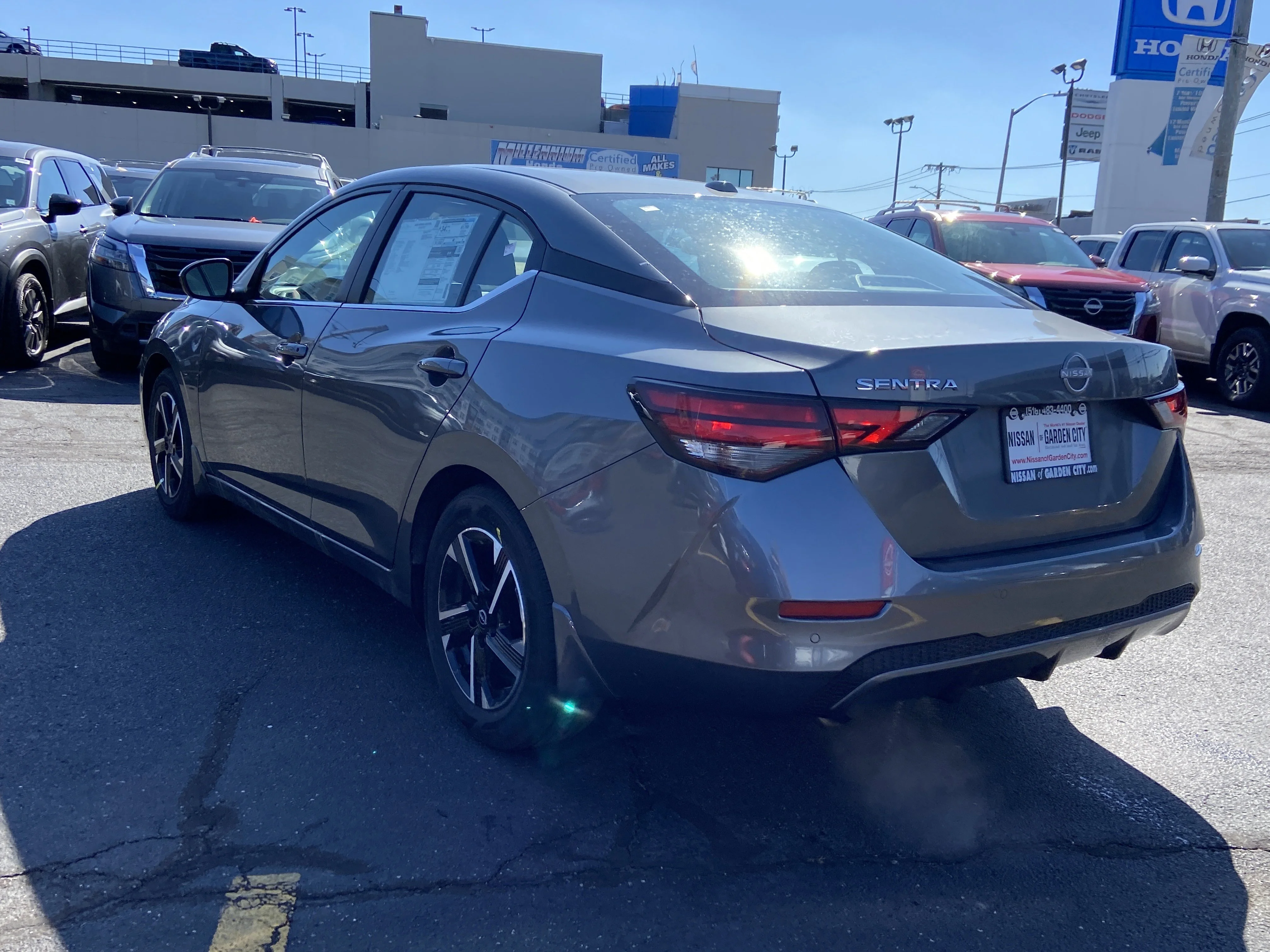 New 2025 Gun Metallic Nissan SV image 6