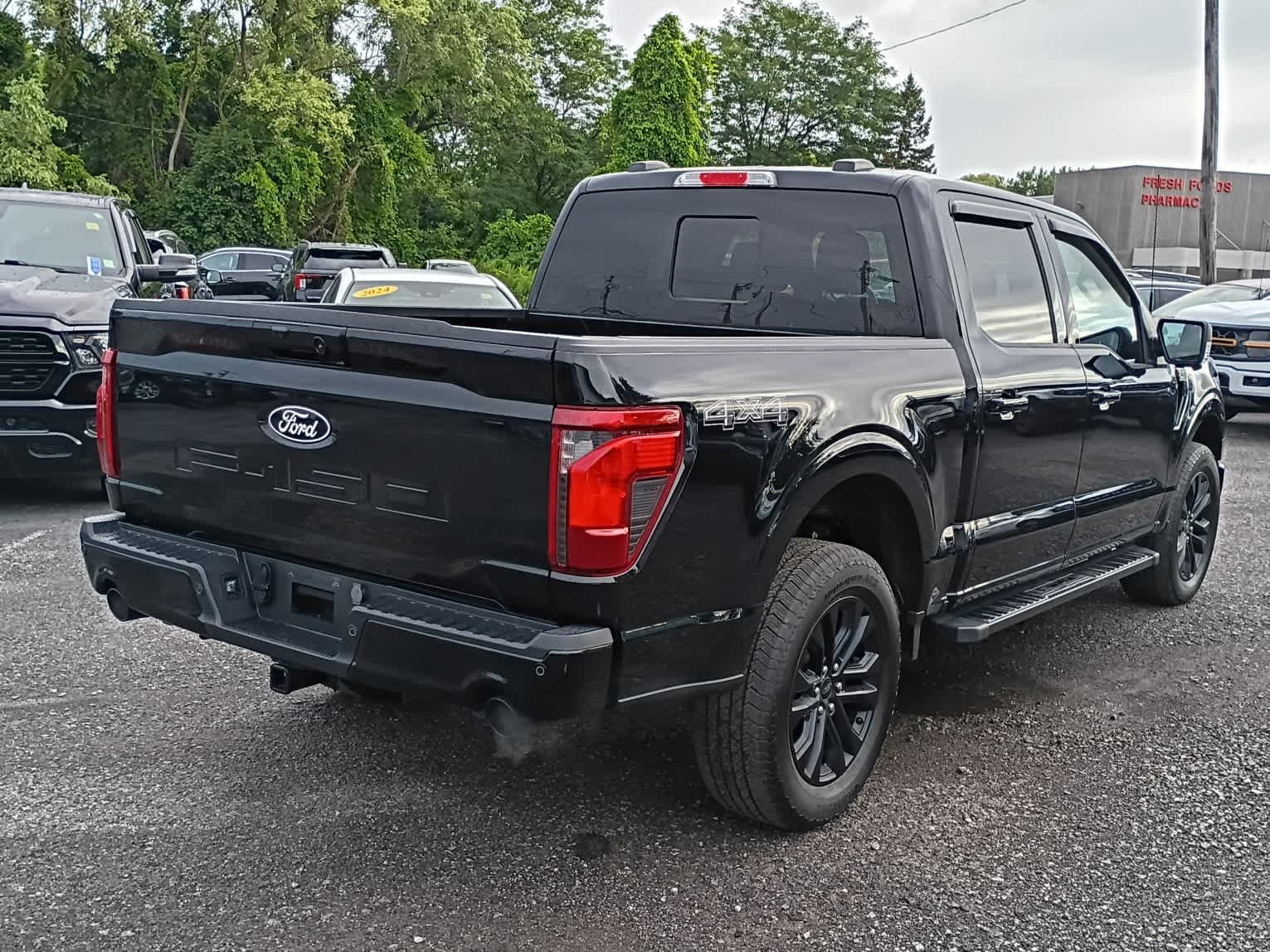 Used 2024 Agate Black Metallic Ford XLT image 3
