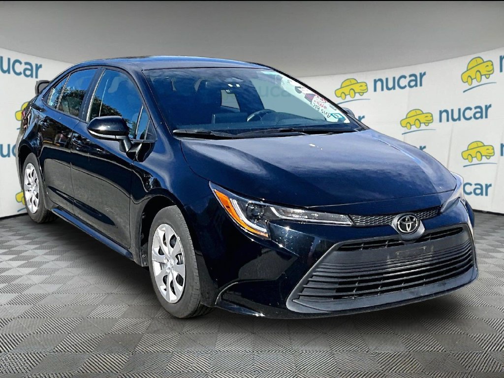 Used 2025 Black Toyota LE image 1