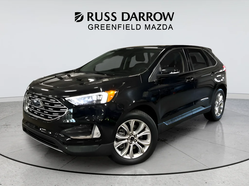 Used 2024 Black Ford Titanium image 1