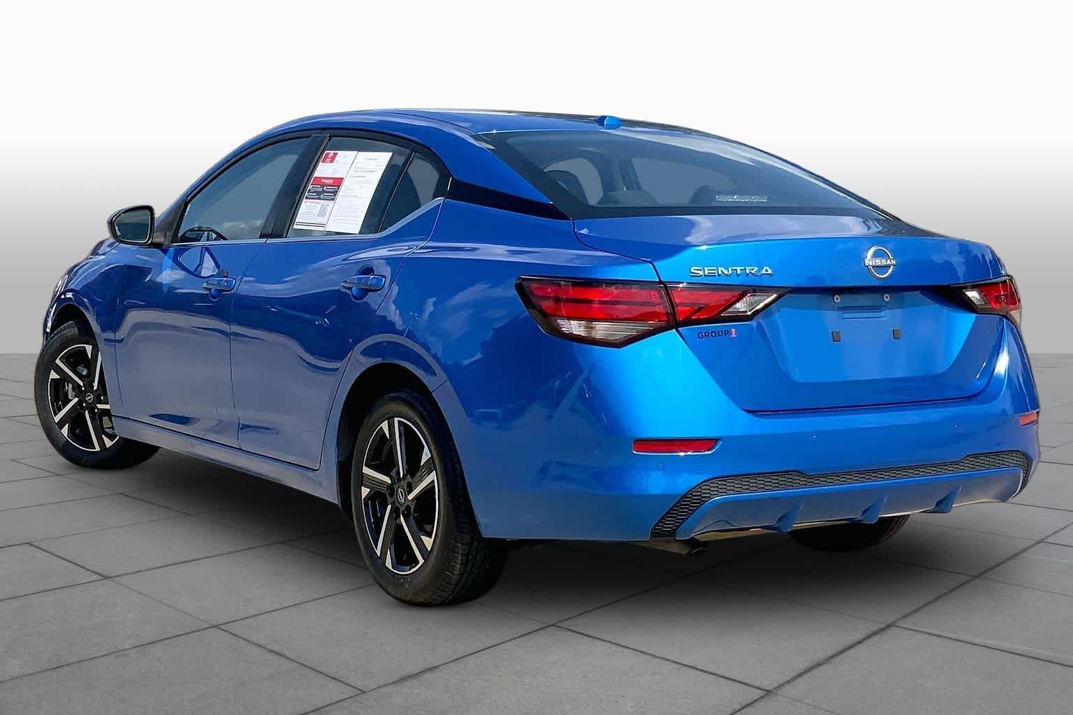 Used 2025 Electric Blue Metallic Nissan SV image 11