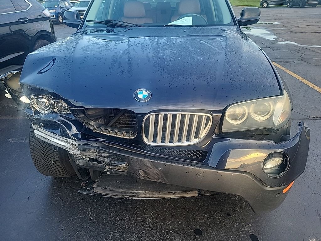 Used 2010 Monaco Blue Metallic BMW xDrive30i image 4