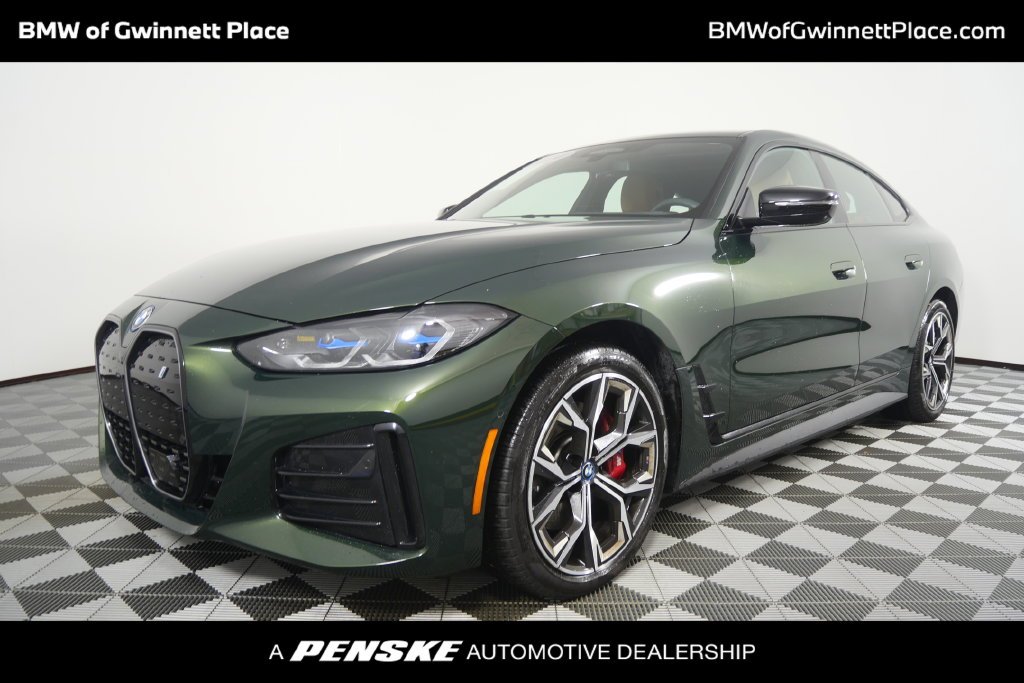Certified Used 2024 San Remo Green Metallic BMW eDrive40 image 1