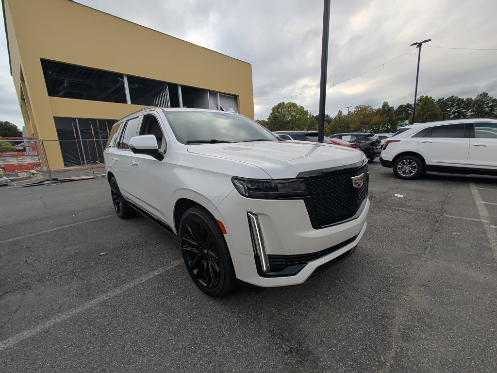 Used 2021 CRYSTAL WHITE TRICOAT Cadillac Sport Platinum image 1