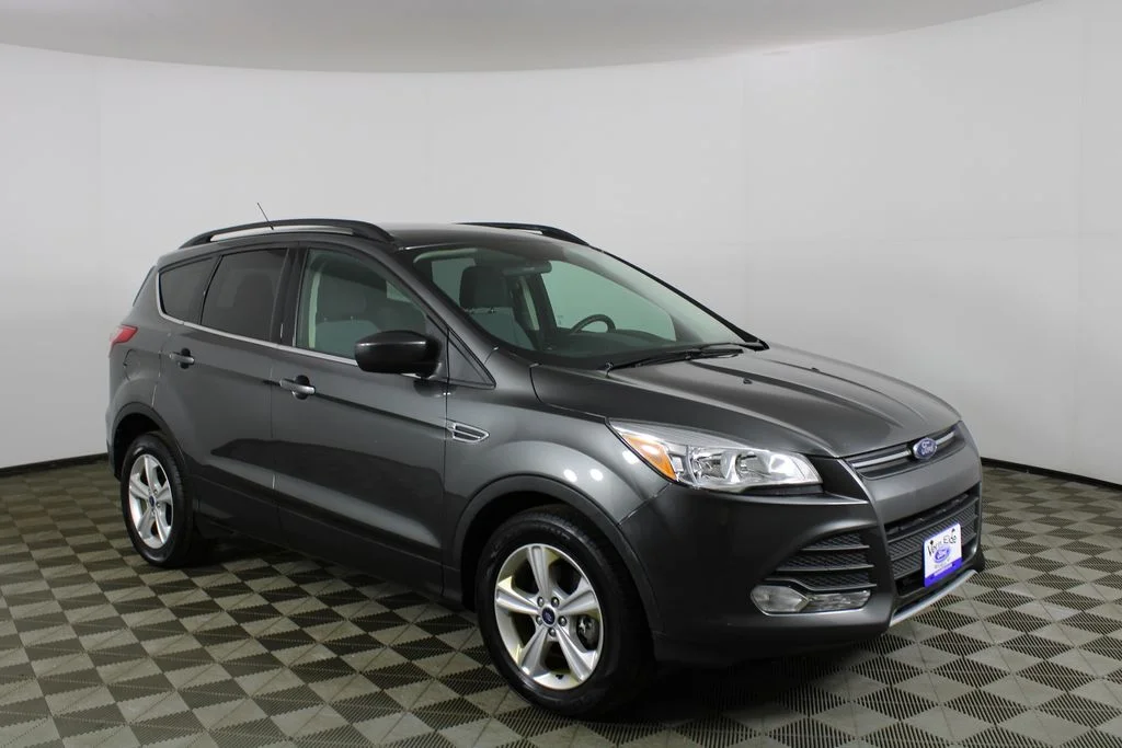 Used 2015 Gray Ford SE image 1
