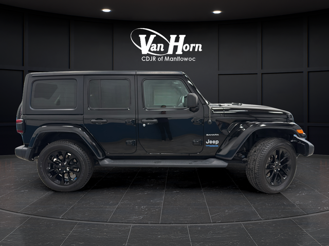 Used 2022 Jeep Wrangler Unlimited Sahara 4XE with VIN 1C4JJXP67NW215528 for sale in Manitowoc, WI
