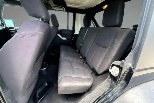 Used 2013 Black Jeep Unlimited Sport image 19