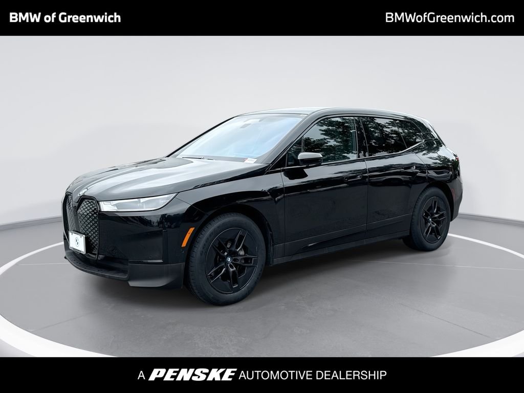 Certified Used 2024 Black BMW xDrive50 image 1