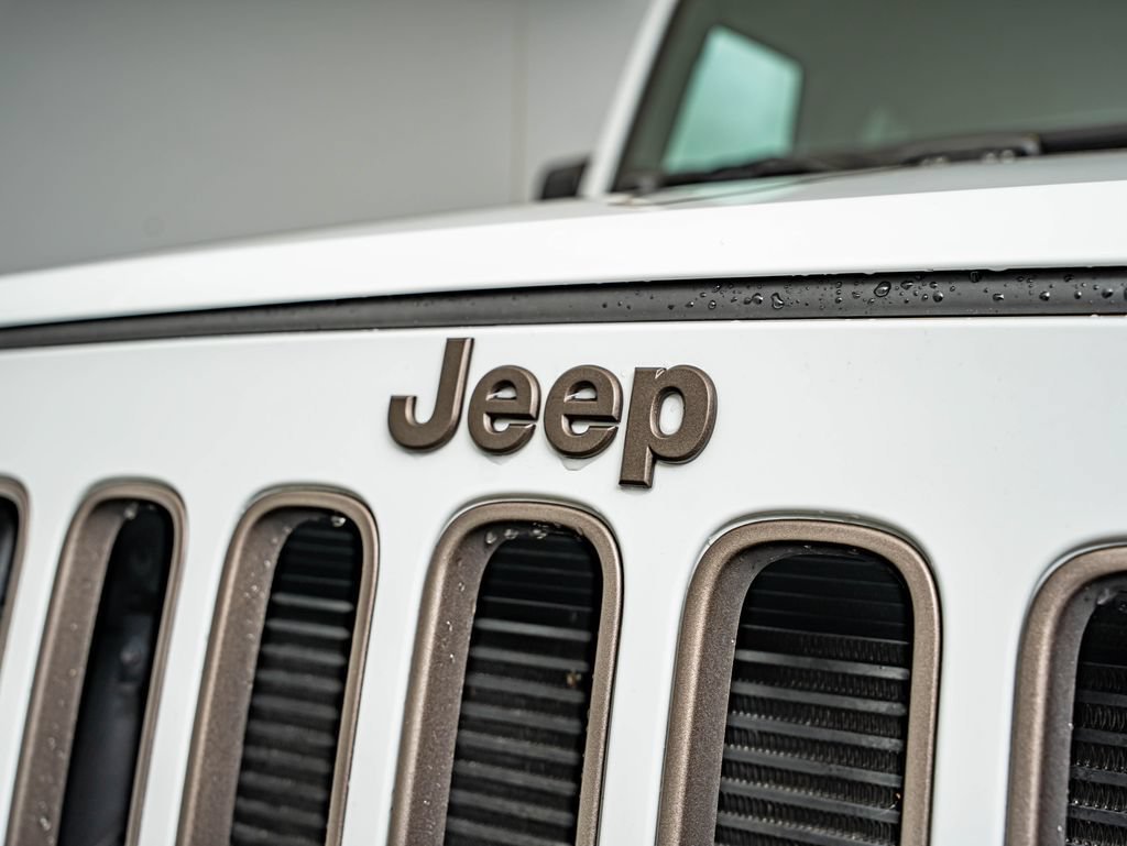 Used 2018 Bright White Clearcoat Jeep Unlimited Sport image 12