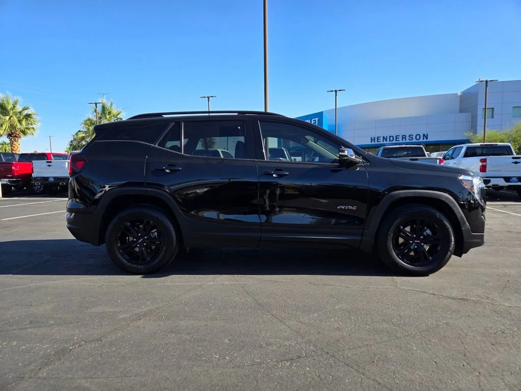 Used 2023 Ebony Twilight Metallic GMC AT4 image 7