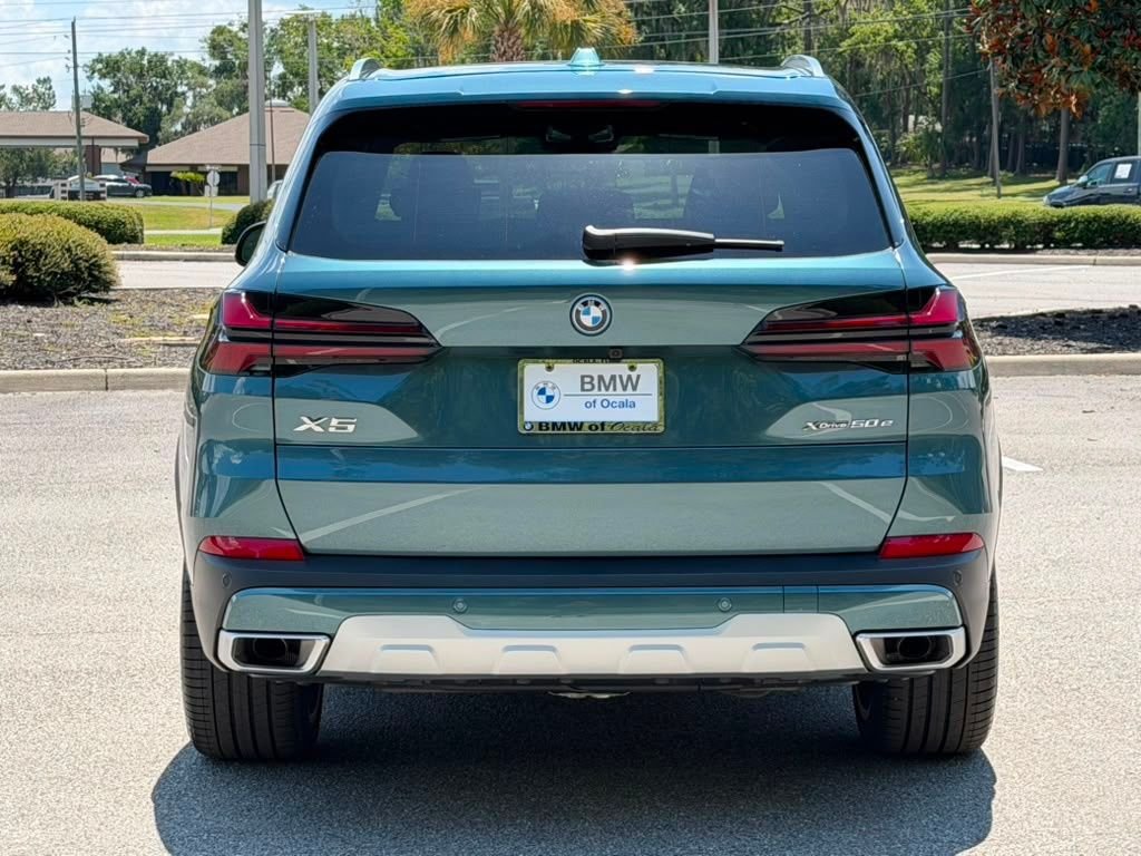 Used 2026 Blue BMW xDrive50e image 4