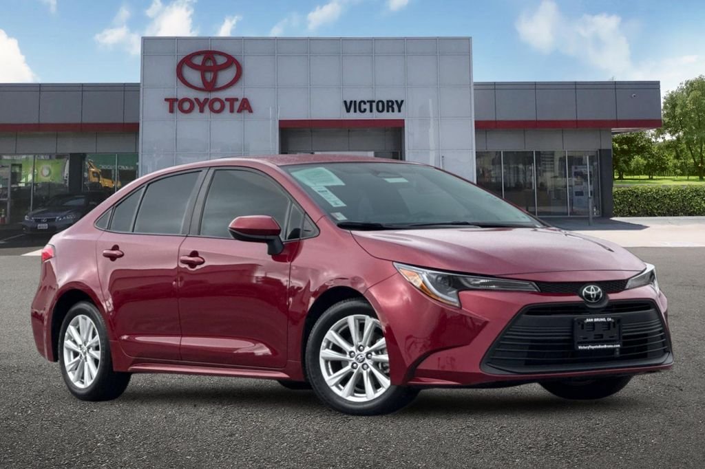 Certified Used 2024 Red Toyota LE image 2