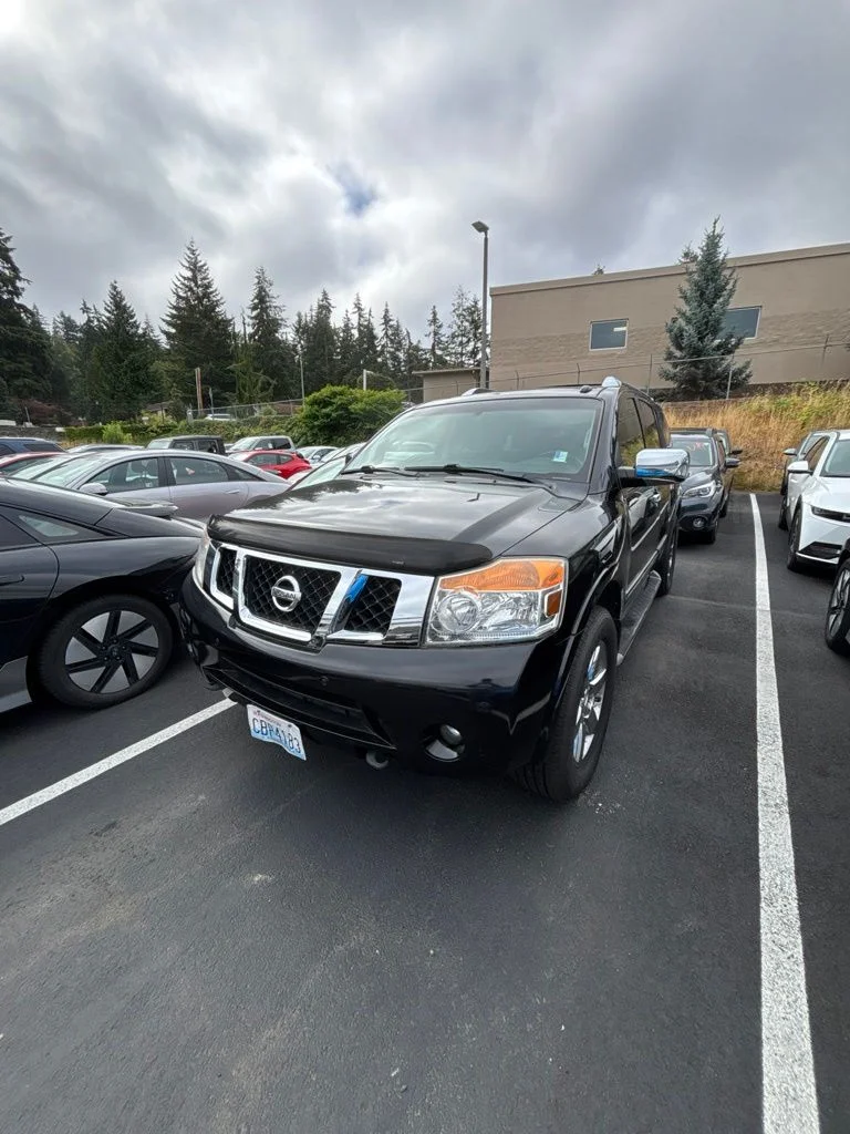 Used 2013 Black Nissan SV image 1