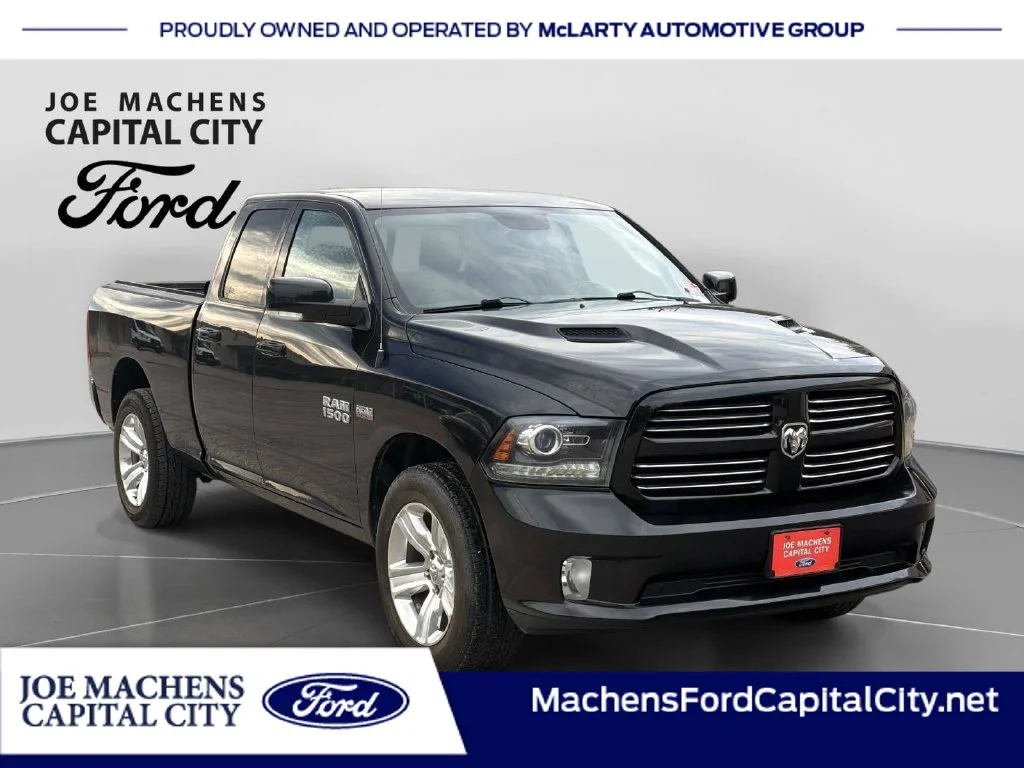 Used 2015 Brilliant Black Crystal Pearlcoat Ram Sport image 1