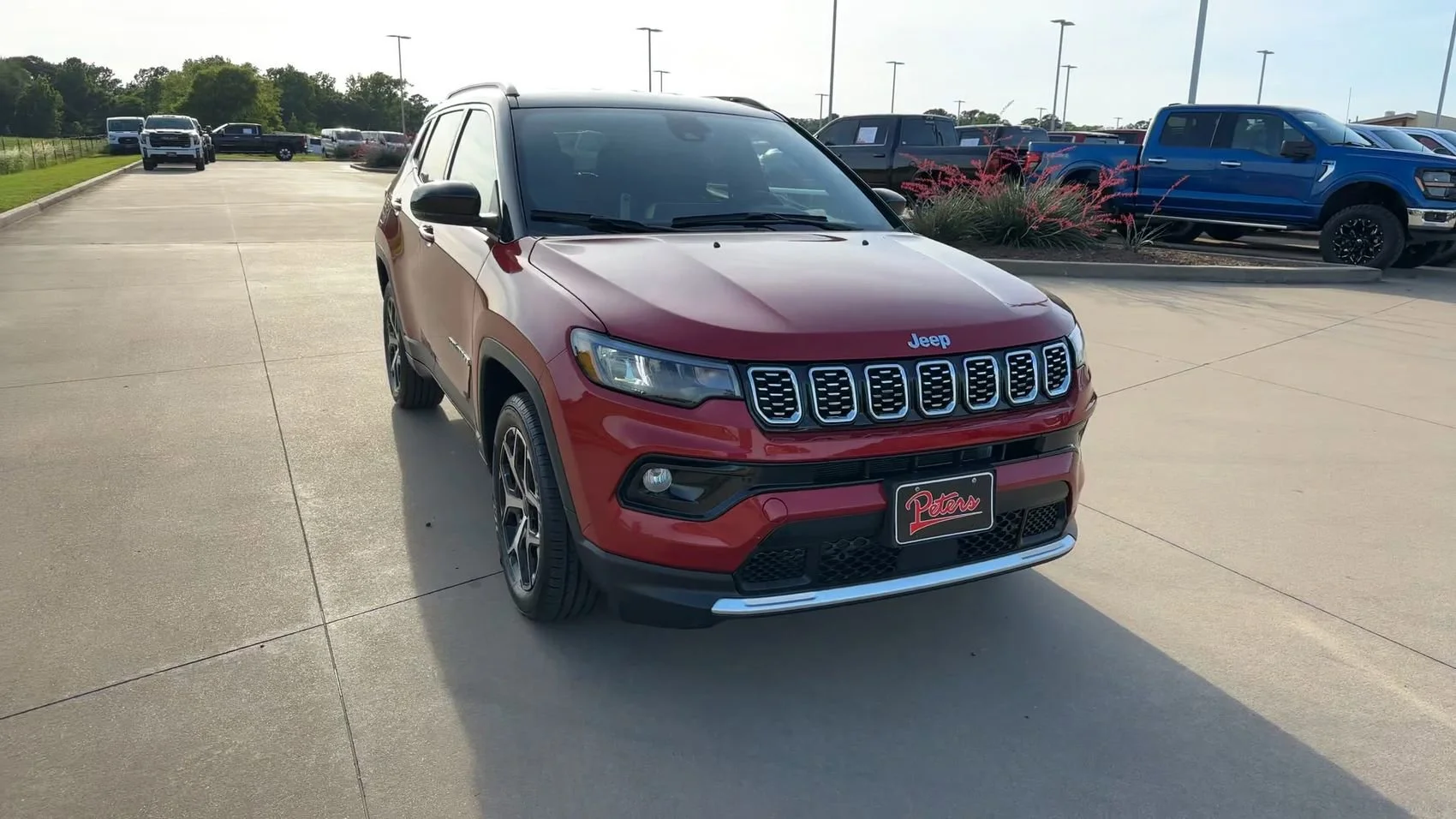 Used 2025 Red Hot Pearlcoat Jeep Limited image 3
