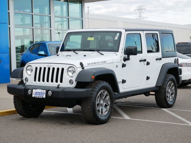 Used 2016 Jeep Wrangler Unlimited Rubicon with VIN 1C4HJWFG0GL243761 for sale in Roseville, Minnesota