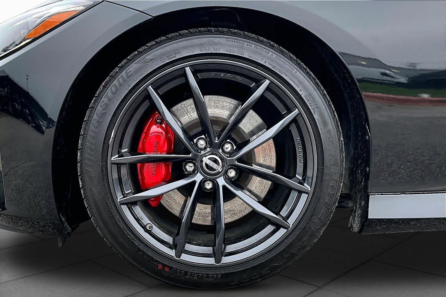 Certified Used 2024 Black Diamond Pearl Nissan Performance image 11