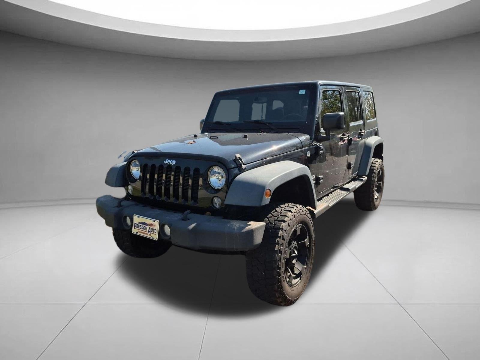 Used 2016 Black Clearcoat Jeep Sport image 1