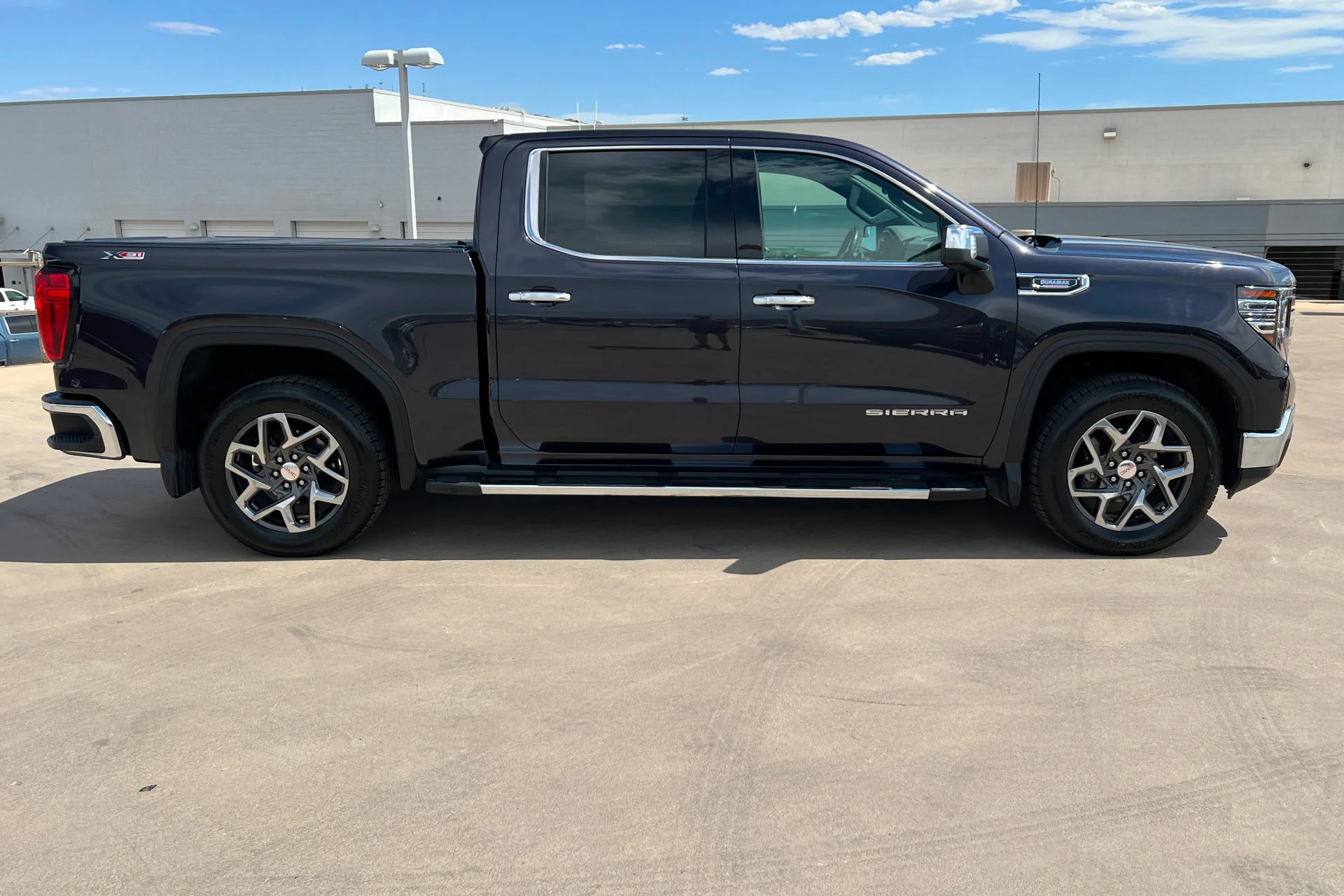 Used 2023 Titanium Rush Metallic GMC SLT image 6